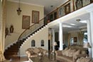 Sitting Room & Sweeping Staircase